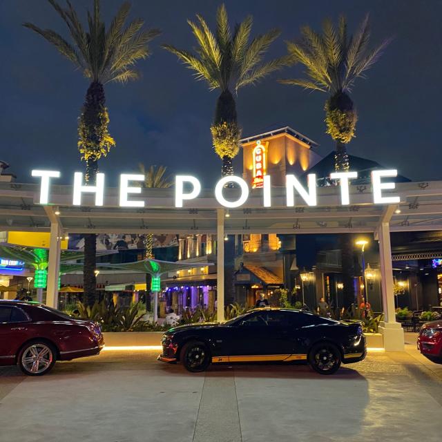 Pointe Orlando sign and valet parking area