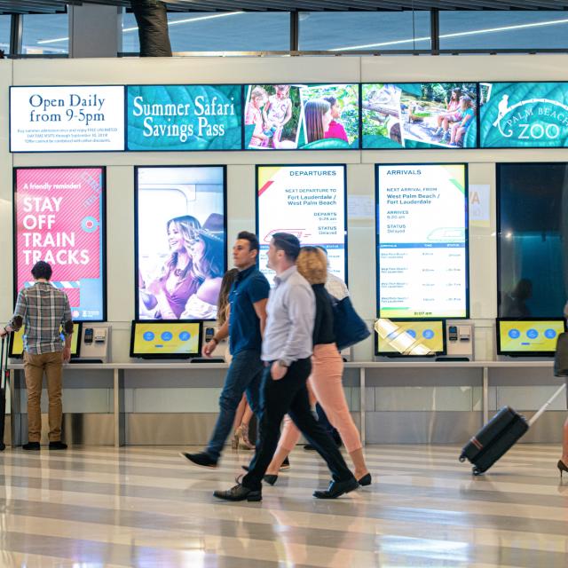 Brightline people at station