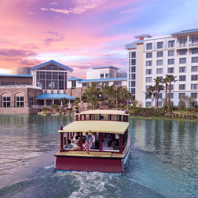 Amatista Cookhouse™ at Loews Sapphire Falls Resort at Universal Orlando™ boat and exterior of resort