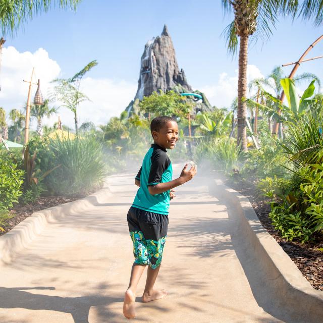 Universal's Volcano Bay™ Honu Ika Moana walkway boy