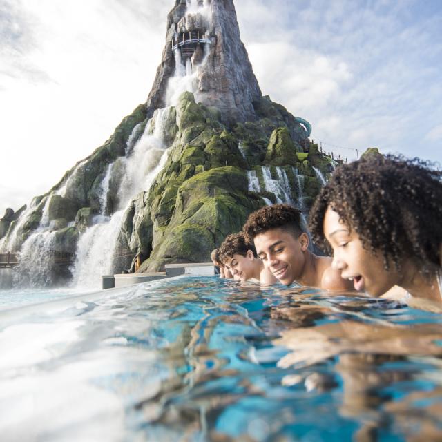 Universal's Volcano Bay™ teens gazing into Reef Leisure Pool