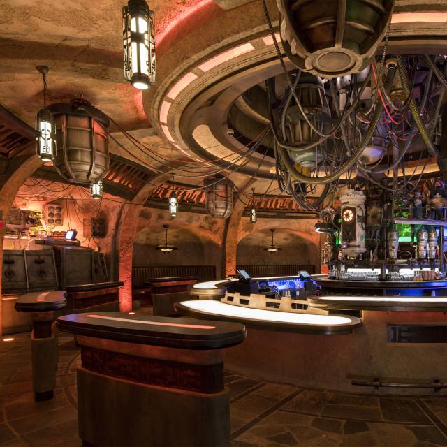 When guests visit Star Wars: Galaxy’s Edge at Disneyland Park in California and opening Aug. 29, 2019, at Disney’s Hollywood Studios in Florida, they’ll find Oga’s Cantina – a local watering hole where galactic travelers unwind, conduct business and maybe even encounter a friend. Patrons of the cantina can sample the famous concoctions created with exotic ingredients using “otherworldly” methods. (David Roark, photographer)