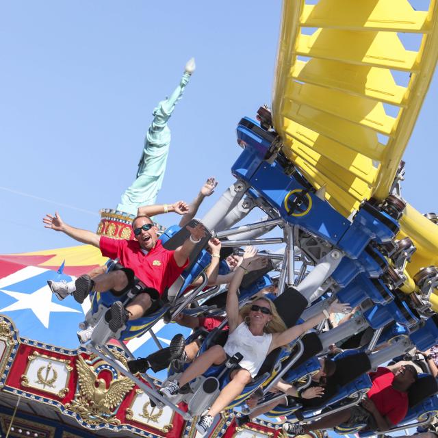 Guests riding the Freedom Flyer ride at Fun Spot America in Orlando.