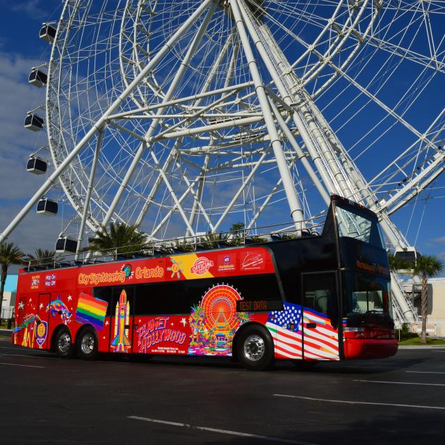 City Sightseeing tour bus in front of the Coca-Cola Orlando Eye
