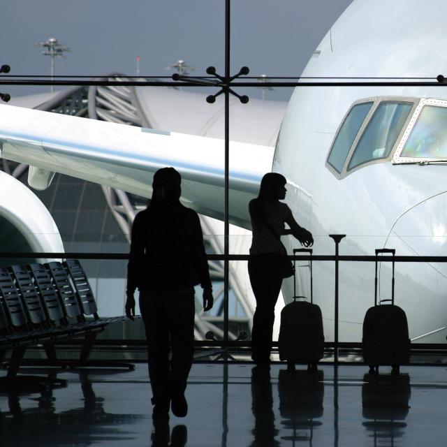 People waiting for a flight at an airport