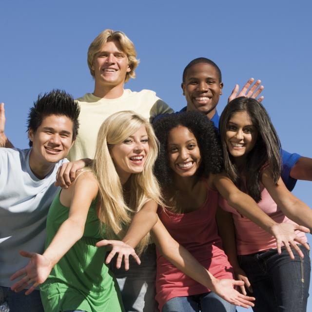 a group of young people smiling