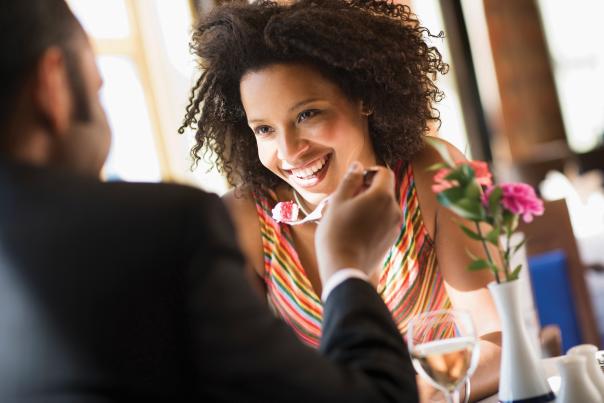 A couple enjoying a meal at a restaurant in Orlando.